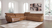 Signature Design by Ashley Temmpton power reclining sectional showcasing plush cushions and modern reclining features.