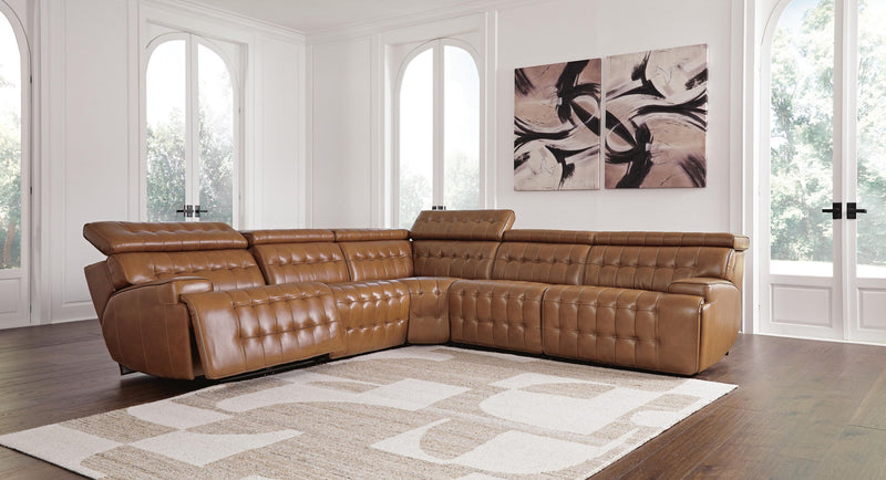 Signature Design by Ashley Temmpton power reclining sectional showcasing plush cushions and modern reclining features.