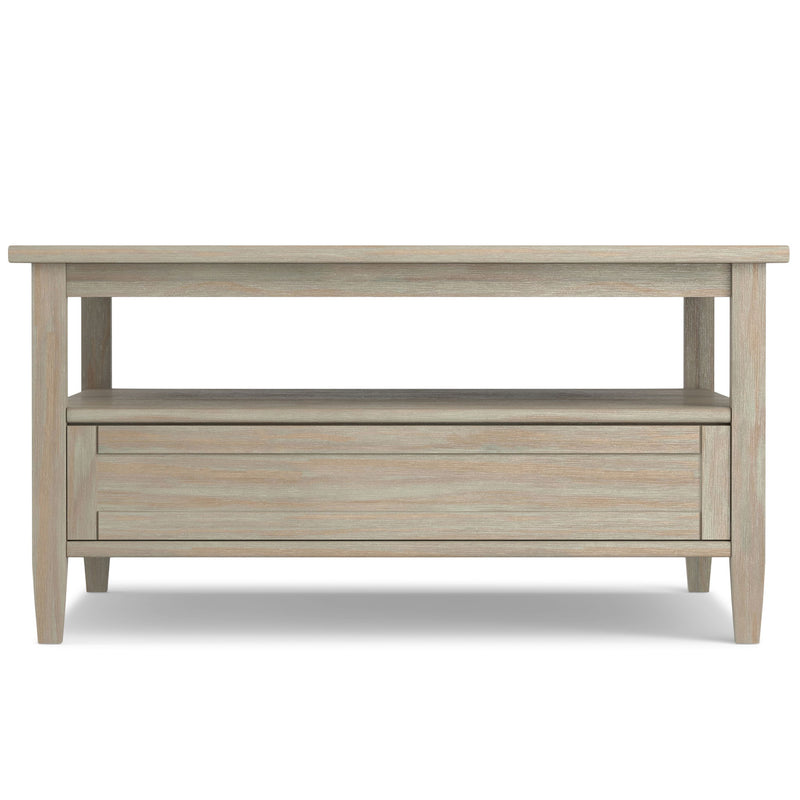 Handcrafted Warm Shaker coffee table by Simpli-Home with a smooth wooden surface and sturdy legs in a cozy living room setting