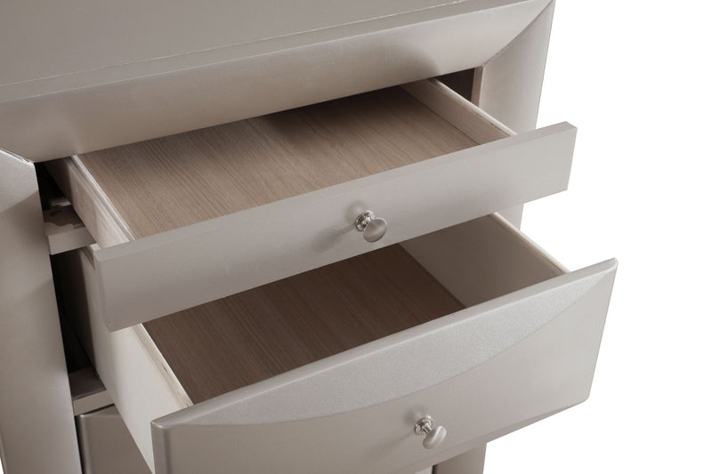 Glory Furniture Marilla 7 Drawer Lingerie Chest with sleek wooden finish and silver handles, showcasing its spacious drawers.