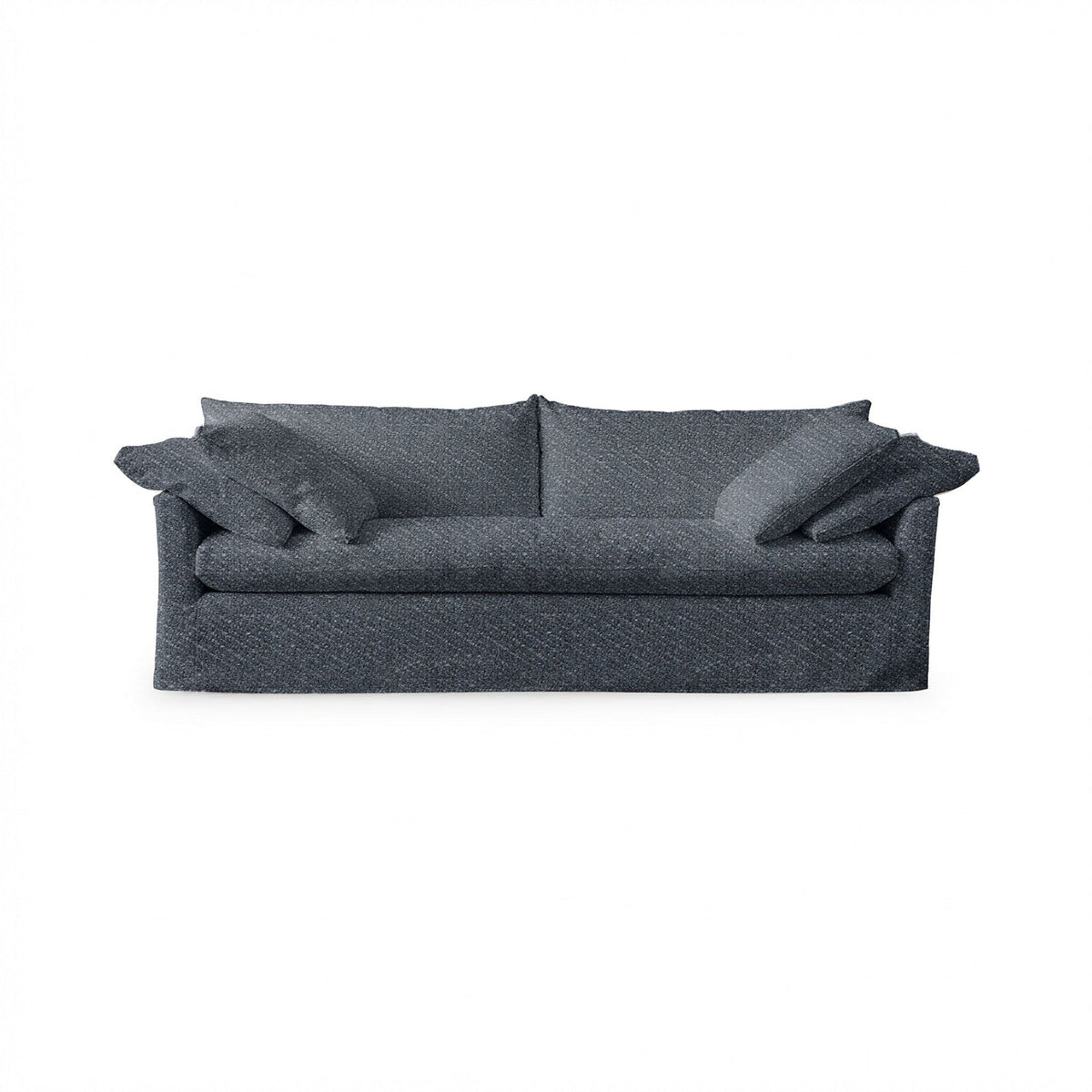 Classic Home Cassiano slip cover sofa with plush cushions and neutral fabric, showcasing a stylish stationary sofa design.