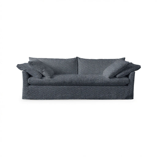 Classic Home Cassiano slip cover sofa with plush cushions and neutral fabric, showcasing a stylish stationary sofa design.