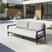 Outdoor Life Outside bench sofa with weather-resistant Ember Black frame and Sunbrella cushion for patio seating.
