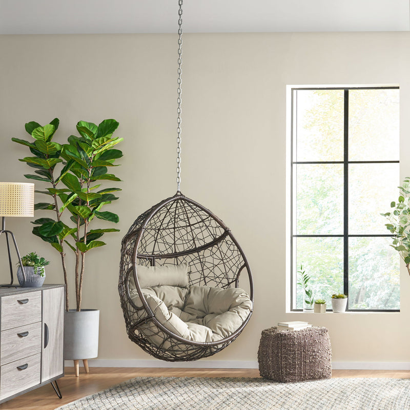 Noble House teardrop hanging chair with 8ft chain, cozy outdoor hammock chair for relaxing and lounging.