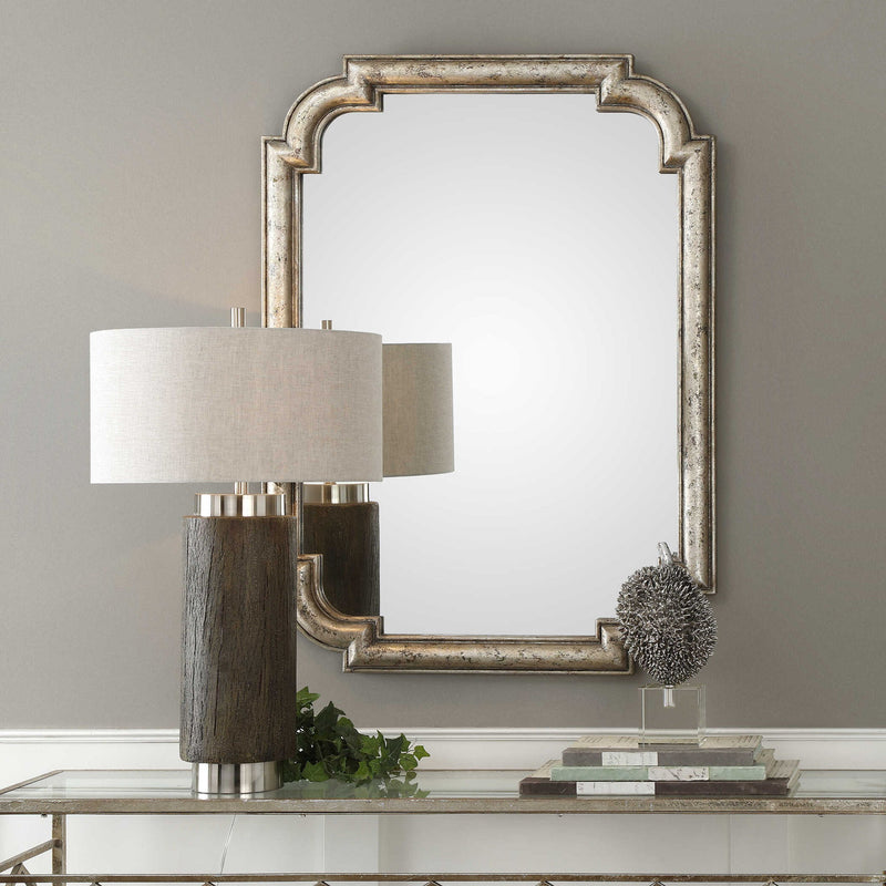 Uttermost Calanna wall mirror with antique silver finish, round shape, decorative frame, ideal for elegant home decor.