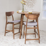 Noble House elegant counter height chair with cushioned seat and wooden legs, suitable for kitchen or bar area.
