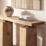 Jennifer Taylor Home Calder console table in natural wood finish, showcasing a sleek modern design with clean lines.