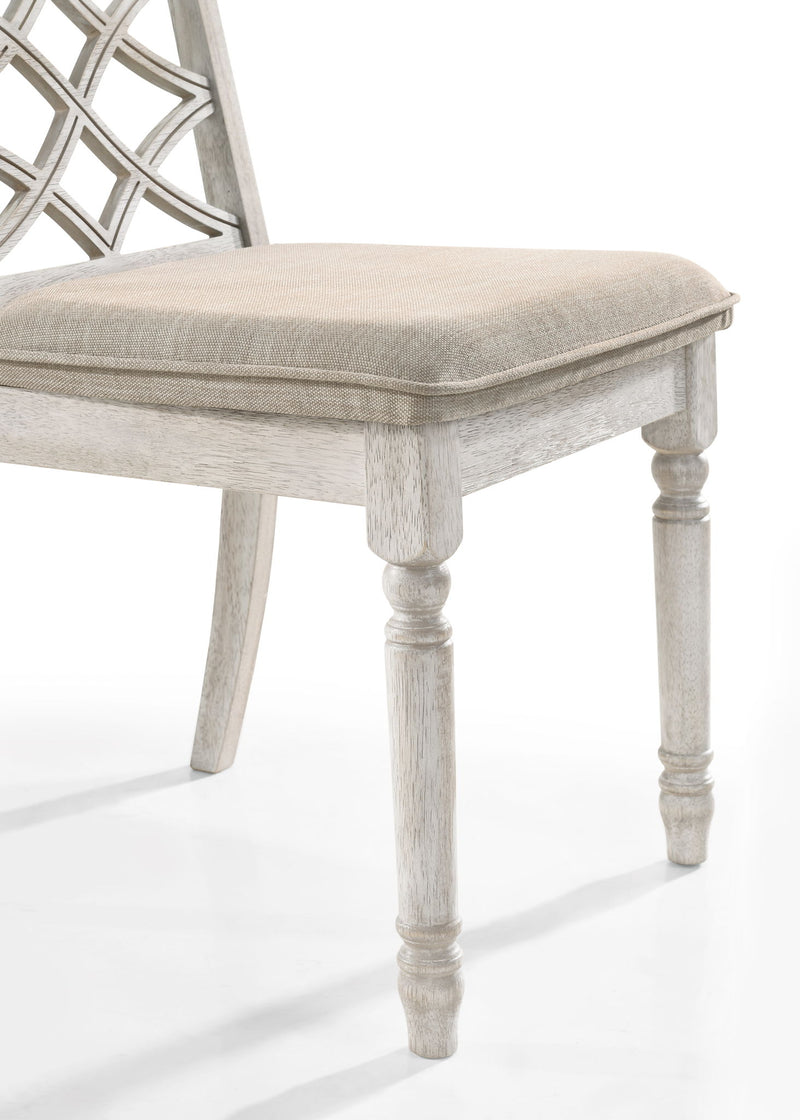 Set of two Lilola Home Havanna wide chairs with off-white cushions, featuring a modern design and sturdy frame.