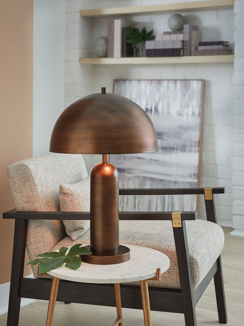 Signature Design by Ashley Wendfield metal floor lamp with a sleek, modern design and a tall, cylindrical shade.