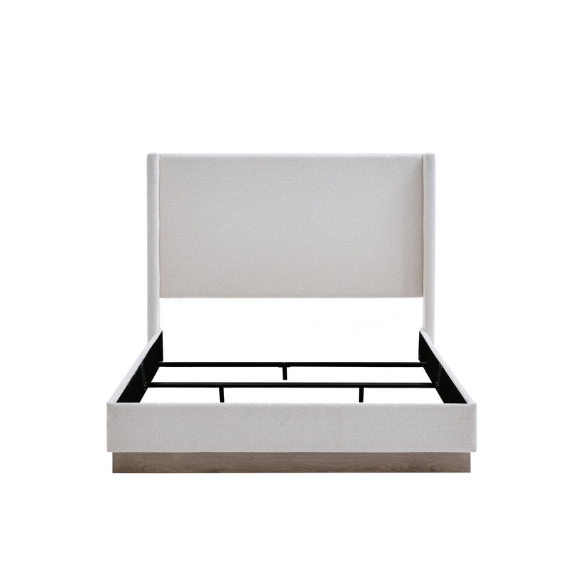 House & Home Furniture Hale upholstered wingback bed with padded headboard and fabric upholstery in a stylish bedroom setting.