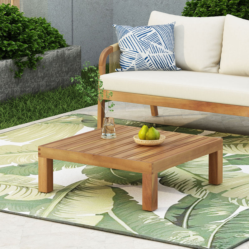 Square outdoor coffee table by Noble House with teak frame and slat top, ideal for patio or garden seating areas.