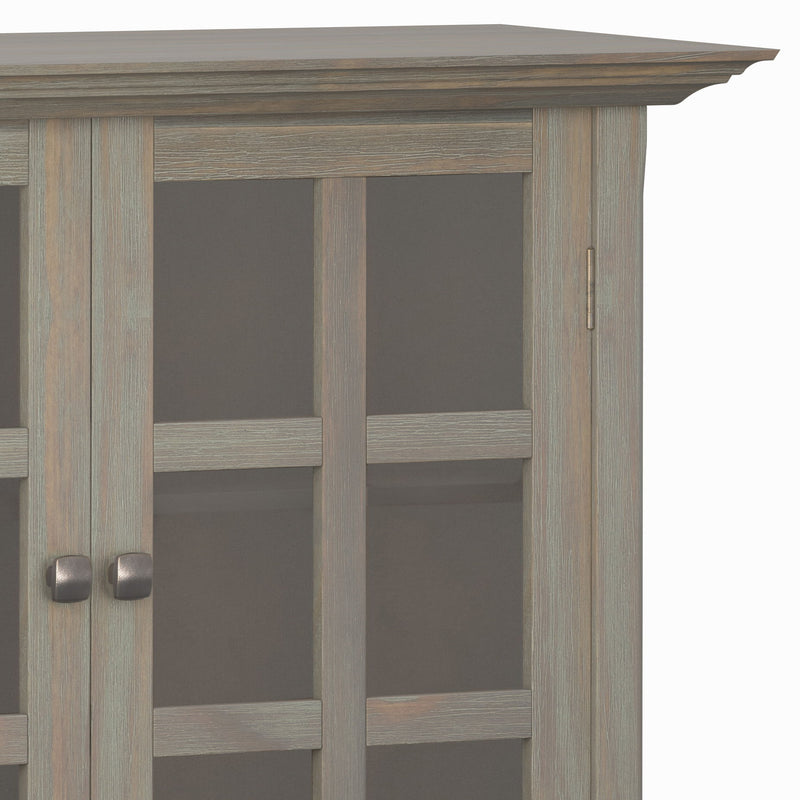 Medium handcrafted Acadian accent storage cabinet by Simpli-Home with wood finish and multiple storage compartments.