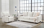 Signature Design by Ashley® Rannis 2-piece living room set with plush sofa and armchair in a modern living space.