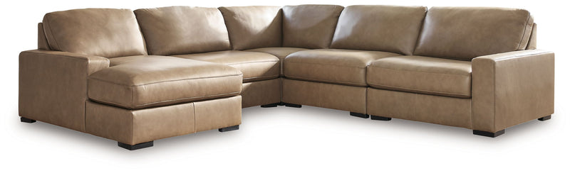 Benchcraft Veronella stationary sectional sofa in neutral fabric, showing plush cushions and modern design.