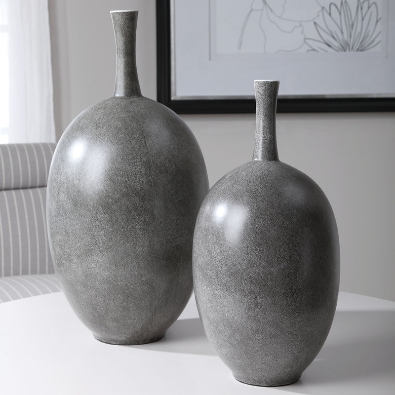 Pair of black modern vases from Uttermost Riordan set, sleek ceramic design for contemporary home decor.