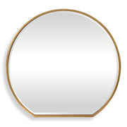 Uttermost Cabell wall mirror with a sleek, modern frame, hanging on a wall in a stylish interior setting.