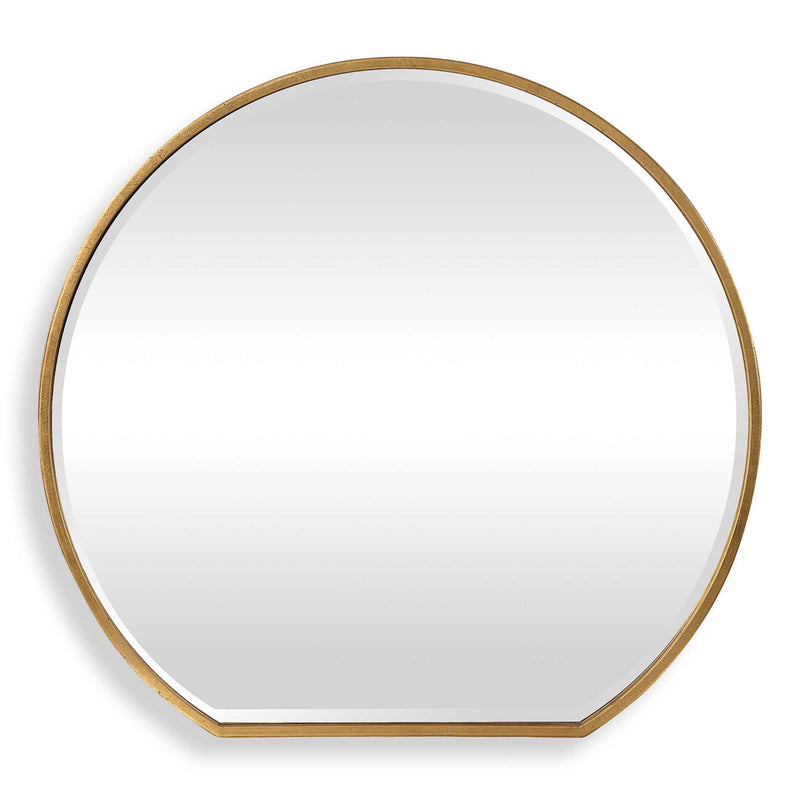 Uttermost Cabell wall mirror with a sleek, modern frame, hanging on a wall in a stylish interior setting.