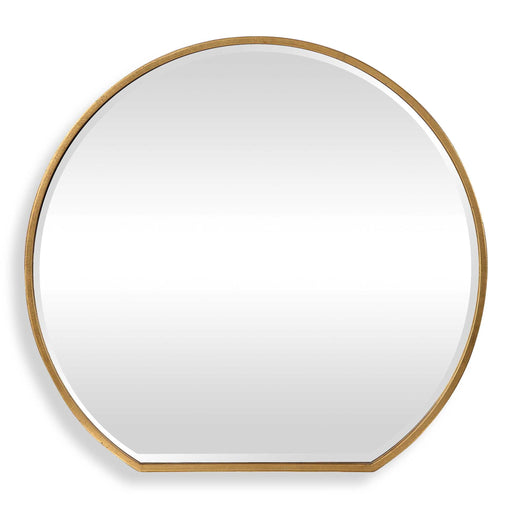 Uttermost Cabell wall mirror with a sleek, modern frame, hanging on a wall in a stylish interior setting.