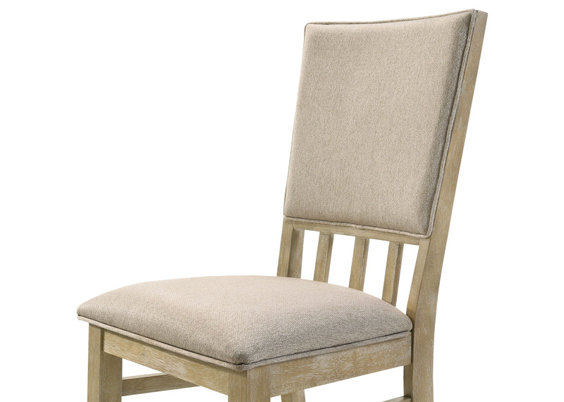 Set of two Lilola Home Brutus wide dining chairs with reclaimed wheat finish, featuring sturdy wooden frames and comfortable seats.