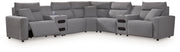 Signature Design by Ashley Modmax II reclining sectional in salt and pepper fabric, featuring multiple seating sections and reclining features.