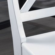 Noble House Plethora dining chairs with X-shaped back, set of 2, featuring wooden legs and upholstered seats for modern dining rooms.