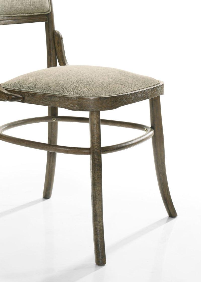 Set of two vintage walnut Bistro dining chairs with cushions by Lilola Home, showcasing curved wooden frames and upholstered seats.