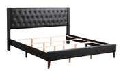 Contemporary upholstered bed by Glory Furniture with a spacious design, featuring a plush headboard in a stylish bedroom setting.