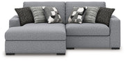 Benchcraft Bealton stationary sectional sofa with plush cushions and neutral fabric, showcasing a modern living room setup.