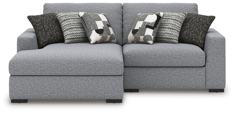 Benchcraft Bealton stationary sectional sofa with plush cushions and neutral fabric, showcasing a modern living room setup.