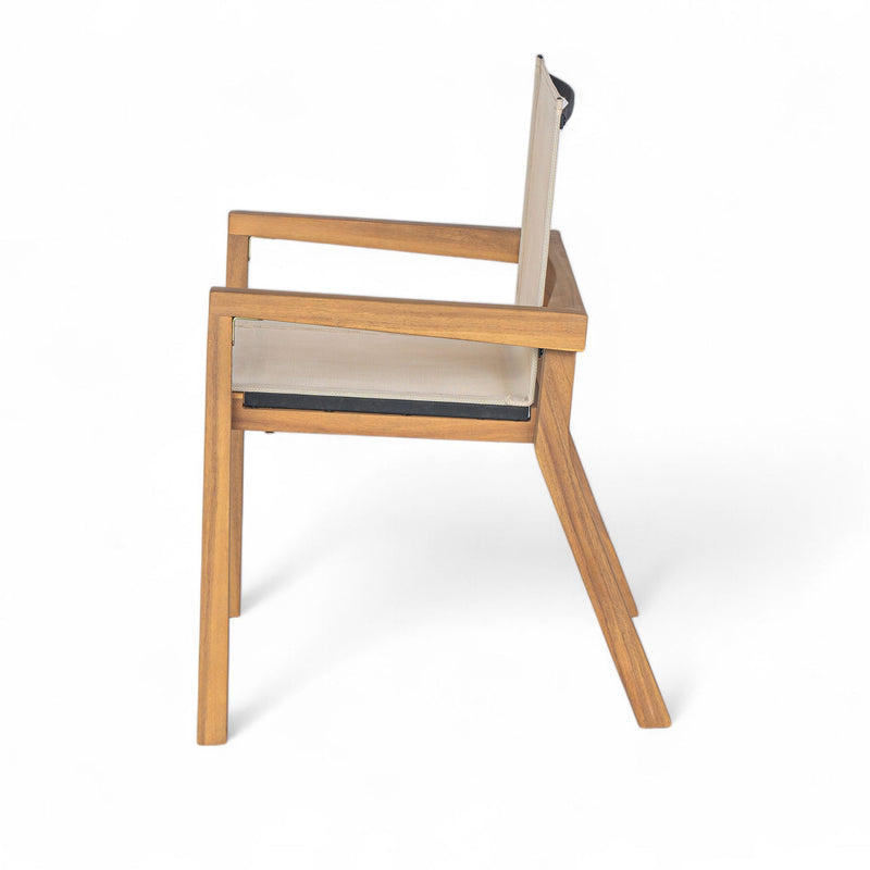 Set of two Noble House Belfast dining chairs with acacia wood frames and cushioned seating, showcasing elegant wood grain details.