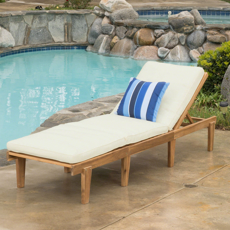 Wood chaise lounge with cushion from Noble House, featuring a sleek design and comfortable seating for relaxing outdoors or indoors.