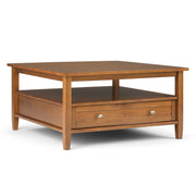 Handcrafted Warm Shaker coffee table by Simpli-Home featuring a smooth wooden surface and sturdy legs.
