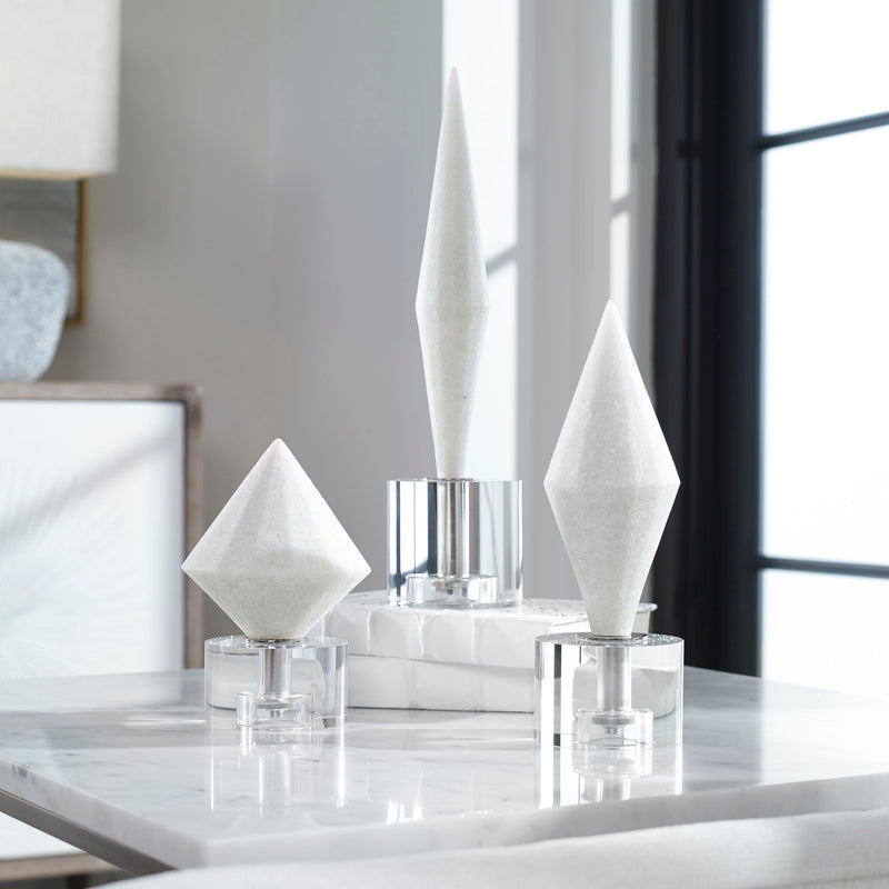 Set of three Alize sculptures by Uttermost, modern decorative figurines with sleek, artistic design for home decor.