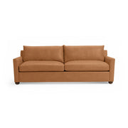 Olivia stationary sofa by Classic Home featuring plush upholstery and a modern design, shown in a cozy living room setting.