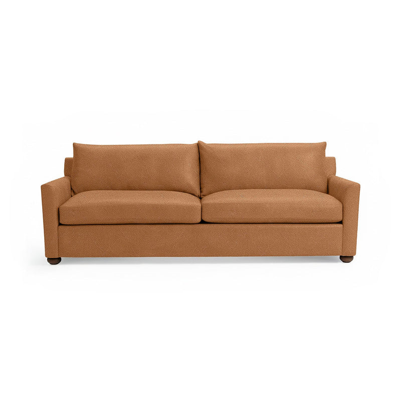 Olivia stationary sofa by Classic Home featuring plush upholstery and a modern design, shown in a cozy living room setting.