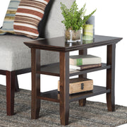 Handcrafted Acadian narrow side table by Simpli-Home, featuring a rustic wooden design and compact, functional surface.