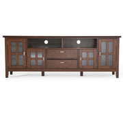 Rustic Russet Brown Artisan TV media stand by Simpli-Home with open shelves and storage compartments for media devices.
