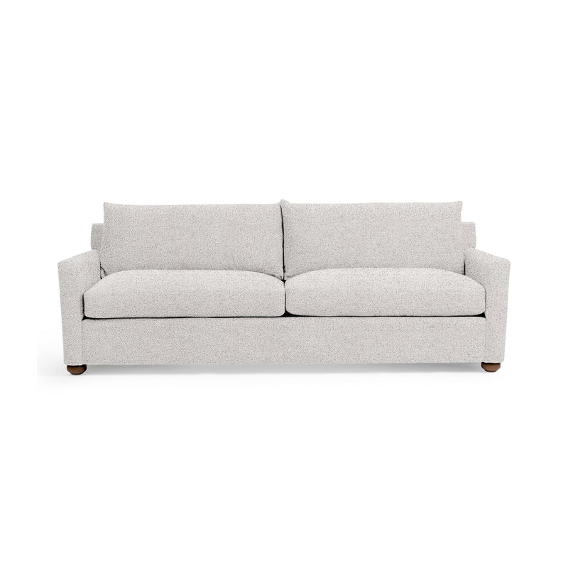 Olivia stationary sofa by Classic Home featuring plush beige upholstery and a comfortable, modern design.