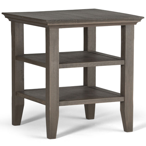 Handcrafted Acadian end table by Simpli-Home featuring a wooden surface and sturdy legs, ideal for living room or bedroom decor.