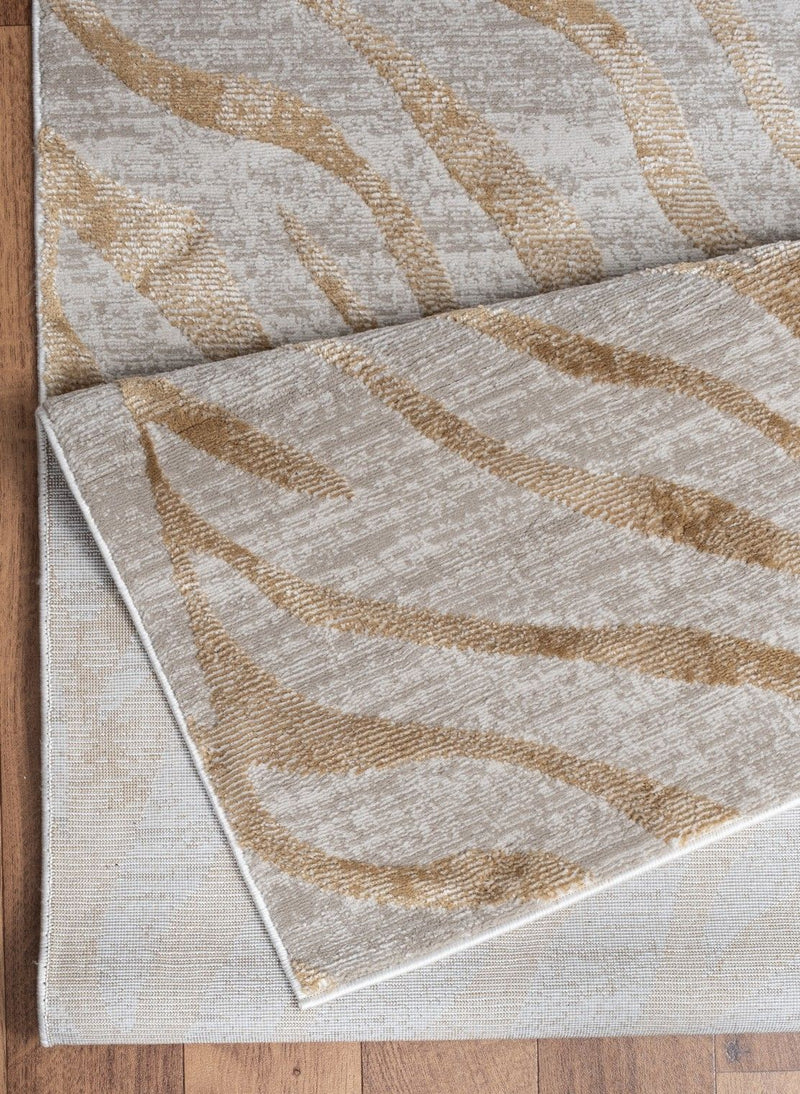 Elegance - 5'3" X 7'3" Area Rug - Gold - R&R Furniture Gallery (Fountain Valley, CA)