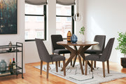 Signature Design by Ashley 5-piece dining room table set with a wooden table and matching chairs, perfect for family meals.