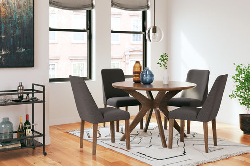 Signature Design by Ashley 5-piece dining room table set with a wooden table and matching chairs, perfect for family meals.