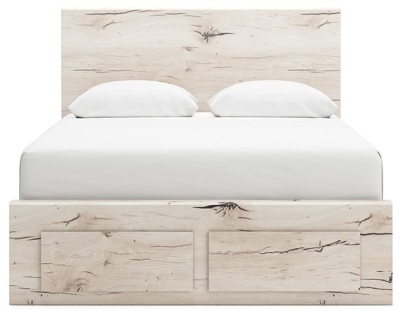 Signature Design by Ashley Lawroy panel bed with built-in storage drawers in a modern bedroom setting.