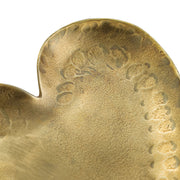 Set of three brass hammered iron heart-shaped catchalls used as decorative serving bowls, by TOV Furniture.