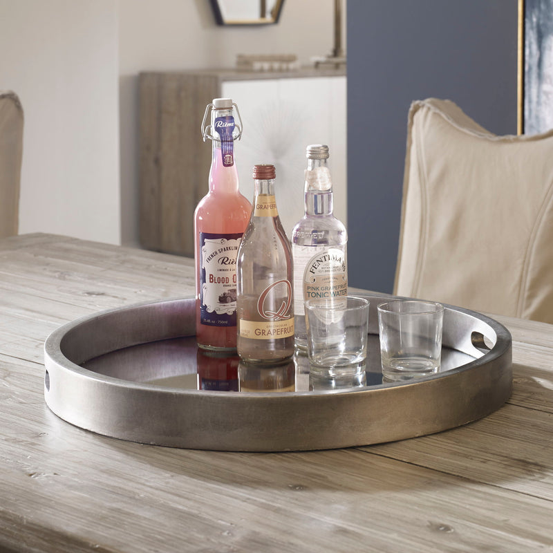 Uttermost Bechet round silver tray with a sleek, polished surface, perfect for serving or decorative display.