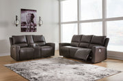 Signature Design by Ashley Boxmere reclining living room set with plush sofas and loveseats, modern upholstery and comfortable design.