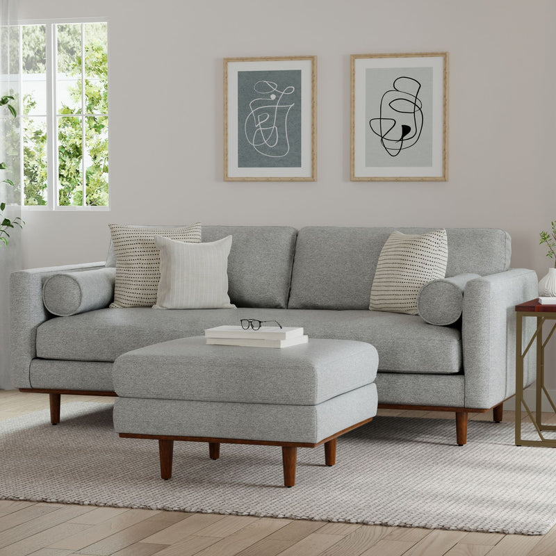 Simpli-Home Morrison upholstered stationary sofa with plush fabric and cushioned seats in a modern living room setting.