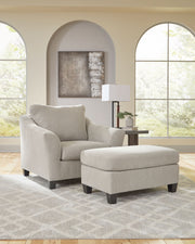 Willarae taupe chair and a half with matching ottoman by Benchcraft®, showcasing plush upholstery and modern design.