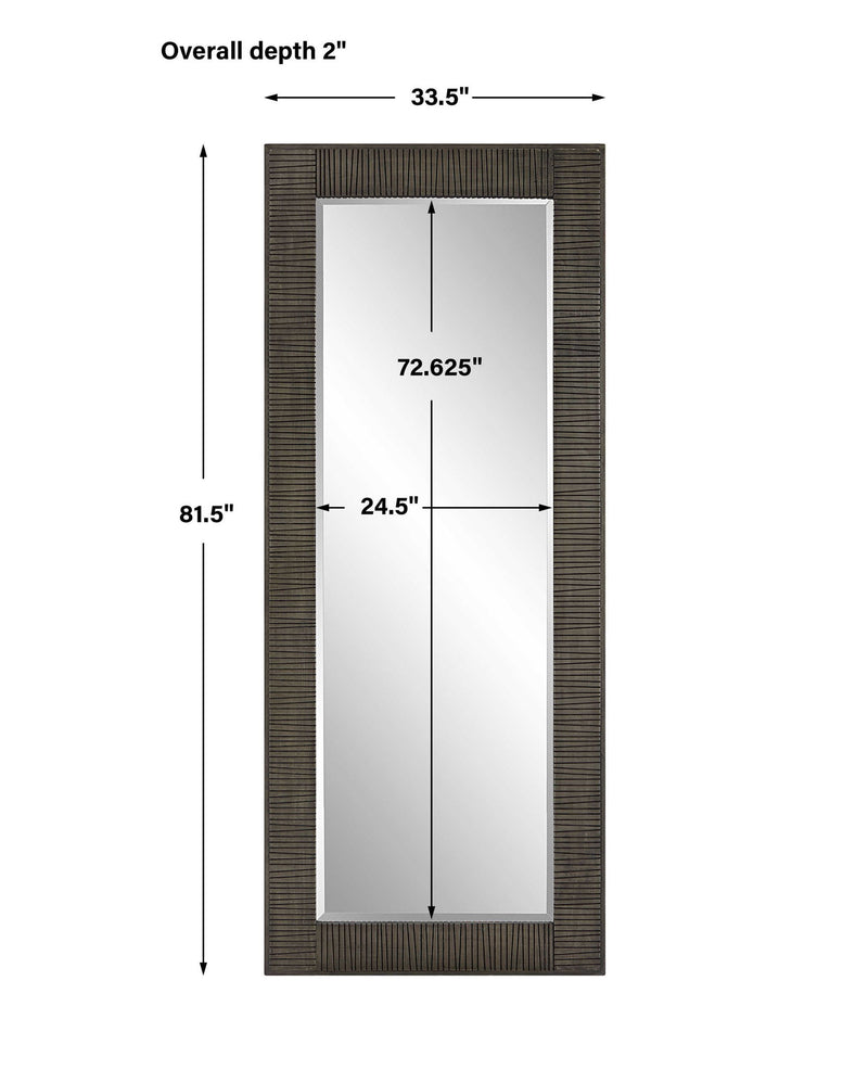 Gray Figaro oversized accent mirror by Uttermost with a bold, decorative frame reflecting in a well-lit room.