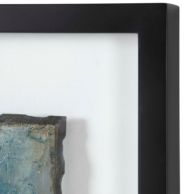 Set of two framed abstract prints featuring shimmering blue agate designs by Uttermost, perfect for modern wall decor.
